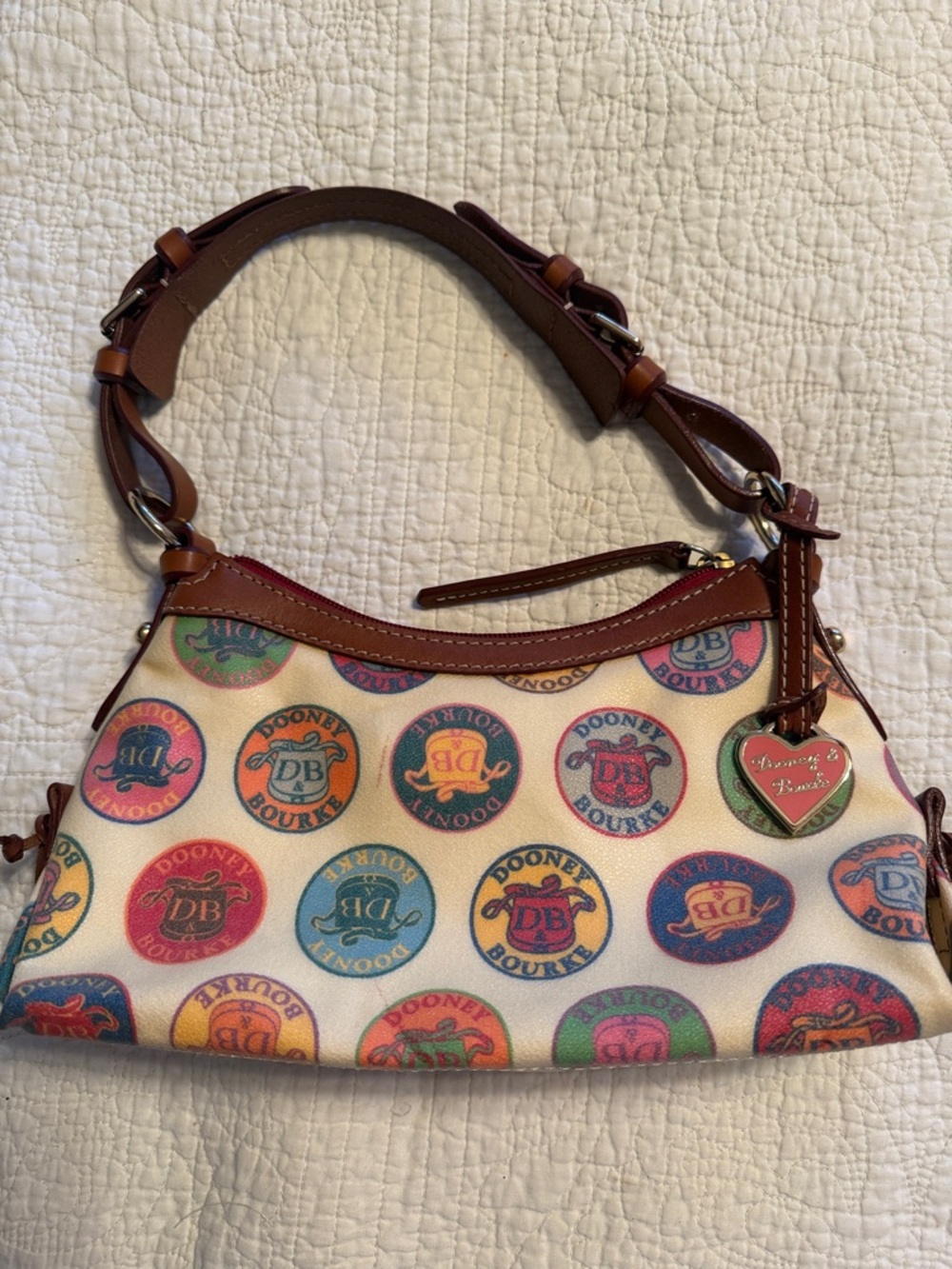 Dooney & Bourke Cream Multicolor Logo Coin Print Purse with Brown Trim